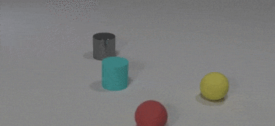 Une balle en caoutchouc rouge frappe un cylindre en caoutchouc bleu qui continue à frapper un cylindre en métal.