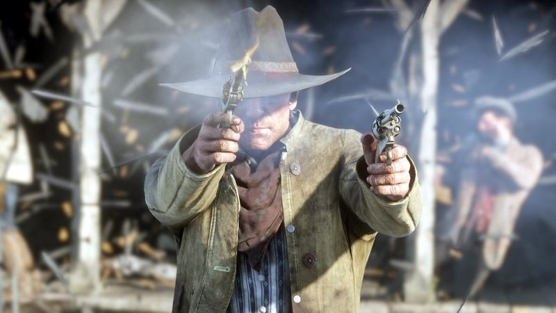 Red Dead Redemption 2:n päähenkilö Arthur Morgan ampuu kaksi revolveria kameraan.