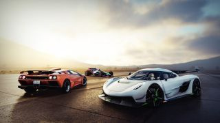 Screenshot van The Crew 2 met drie auto