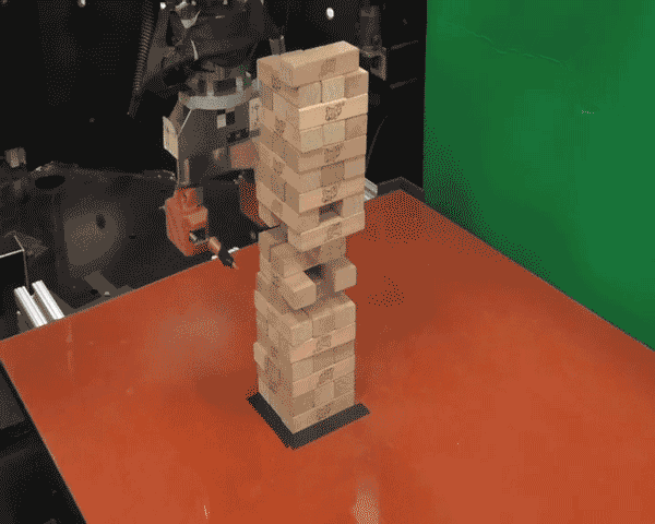 Animiertes GIF eines Roboterarms, der Jenga spielt